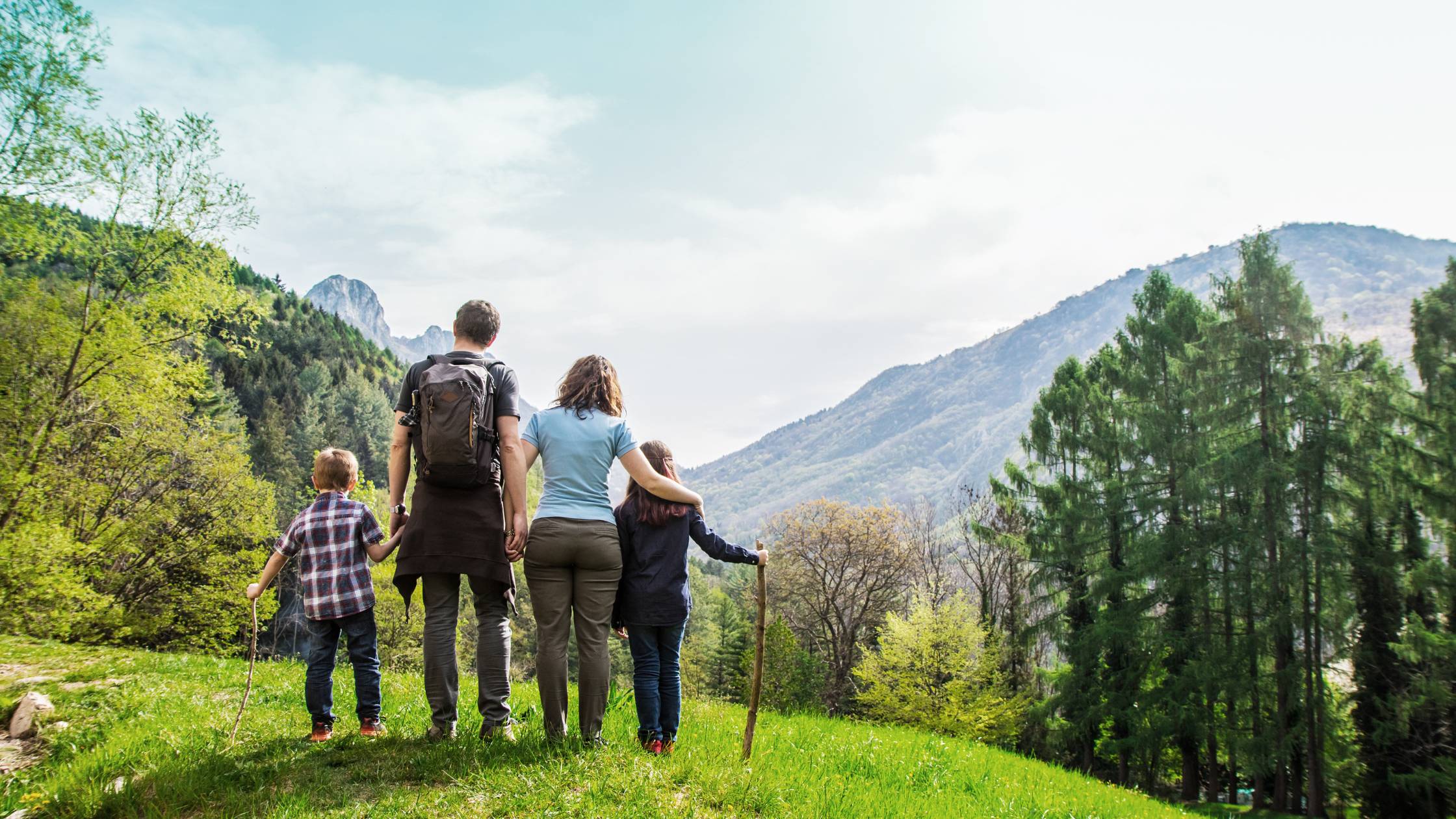 Family hike Family on top of hill